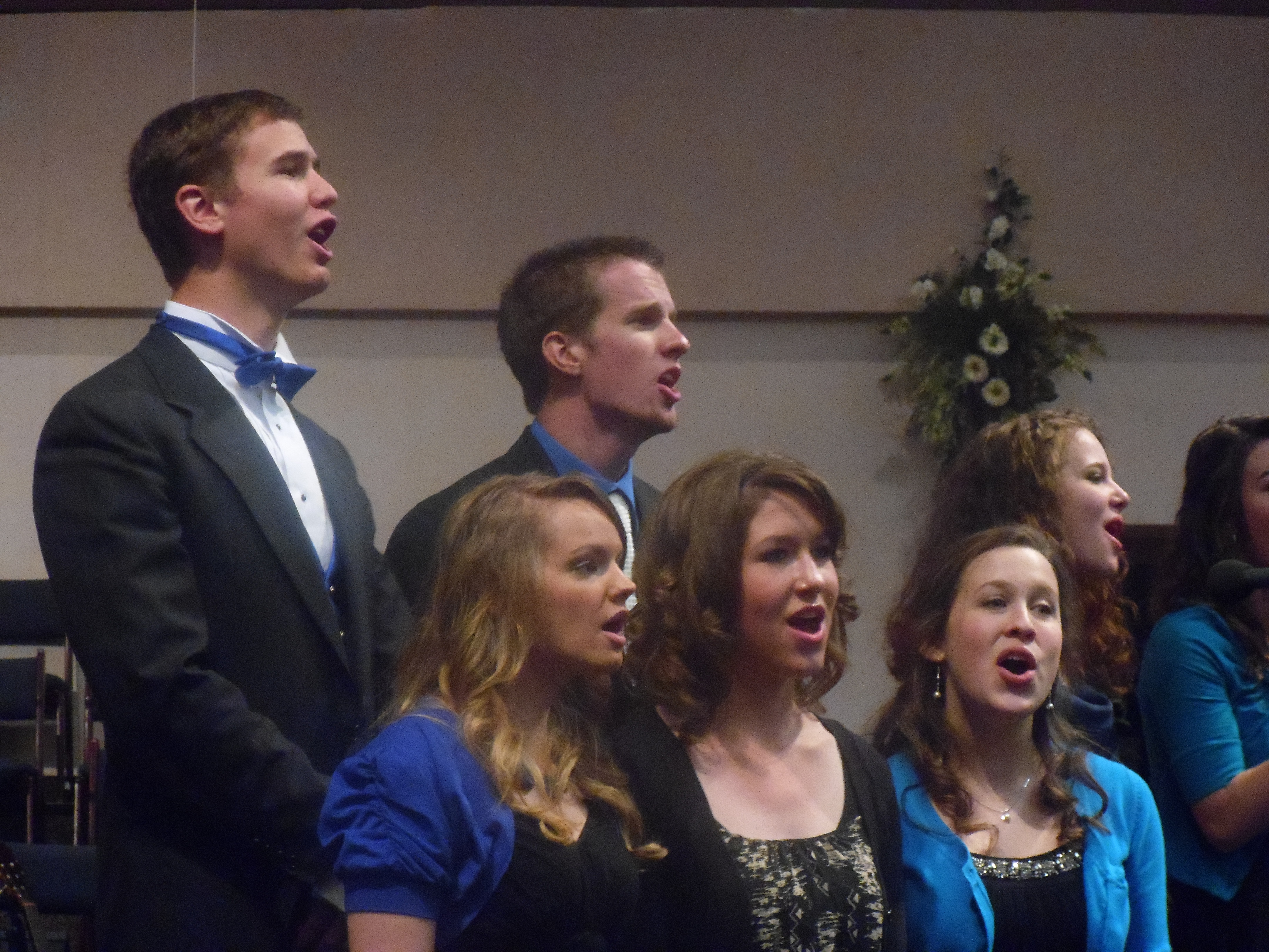 Hannah and friends singing during her graduation ceremony