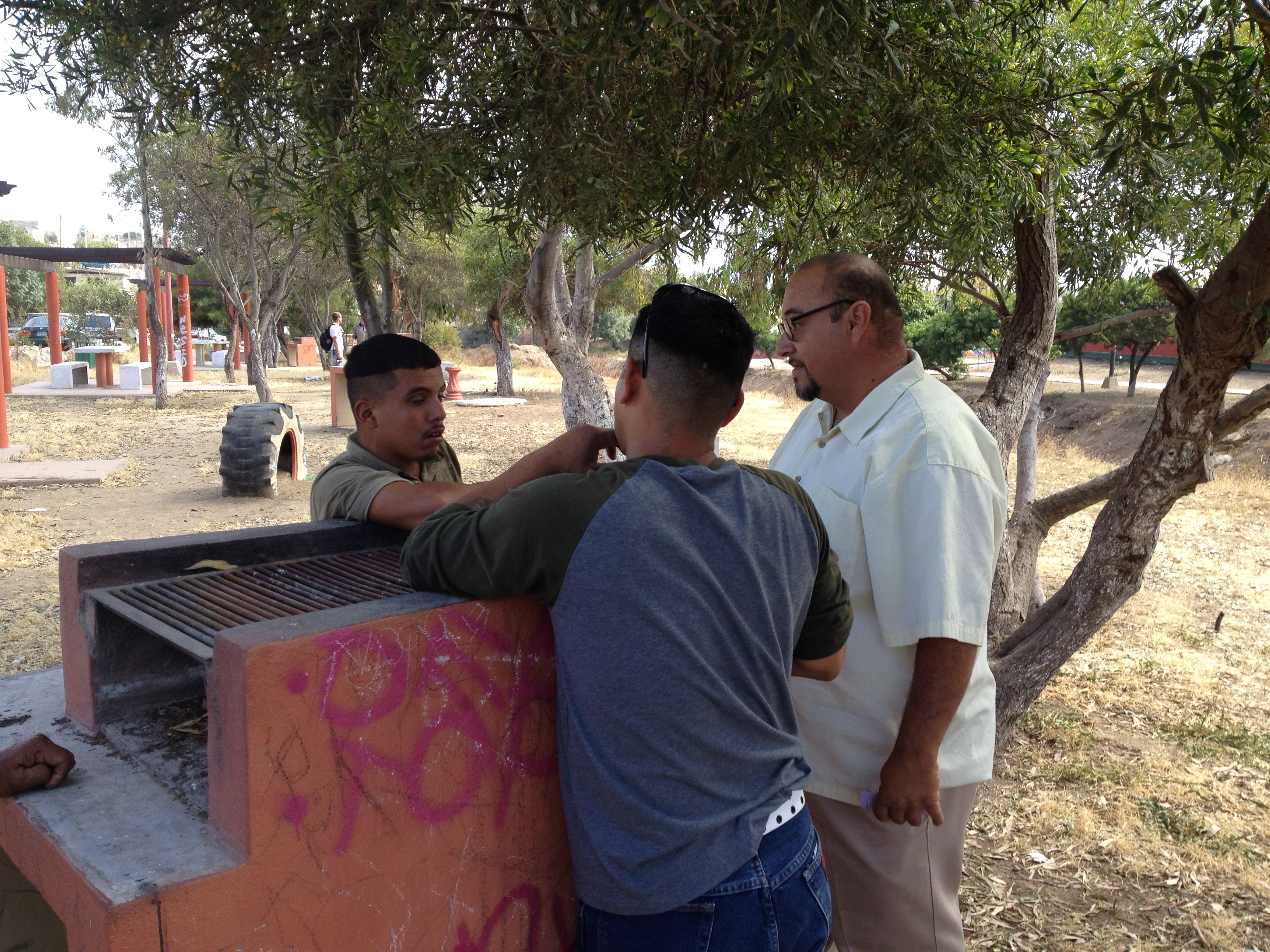 Pastor Leo & Luis sharing with Marvin