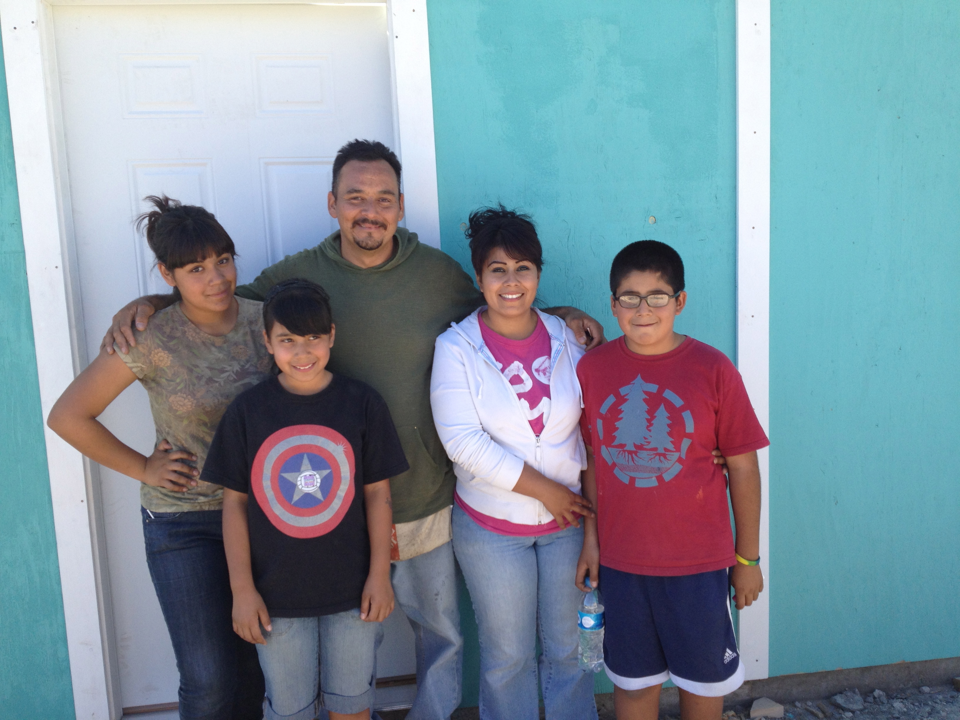 Pastor Rodrigo with his wife, Nancy and their children