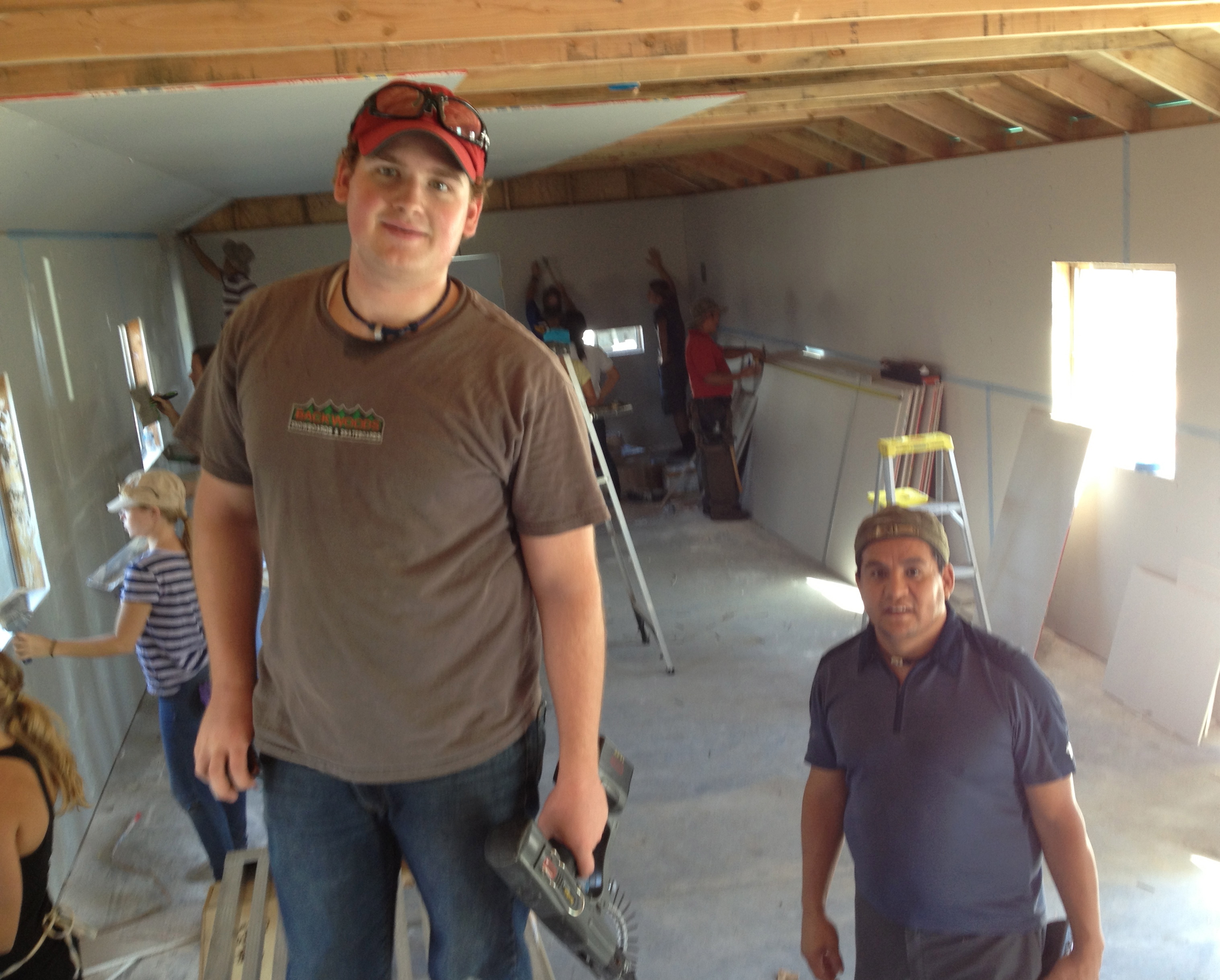 David & Issaid working hard