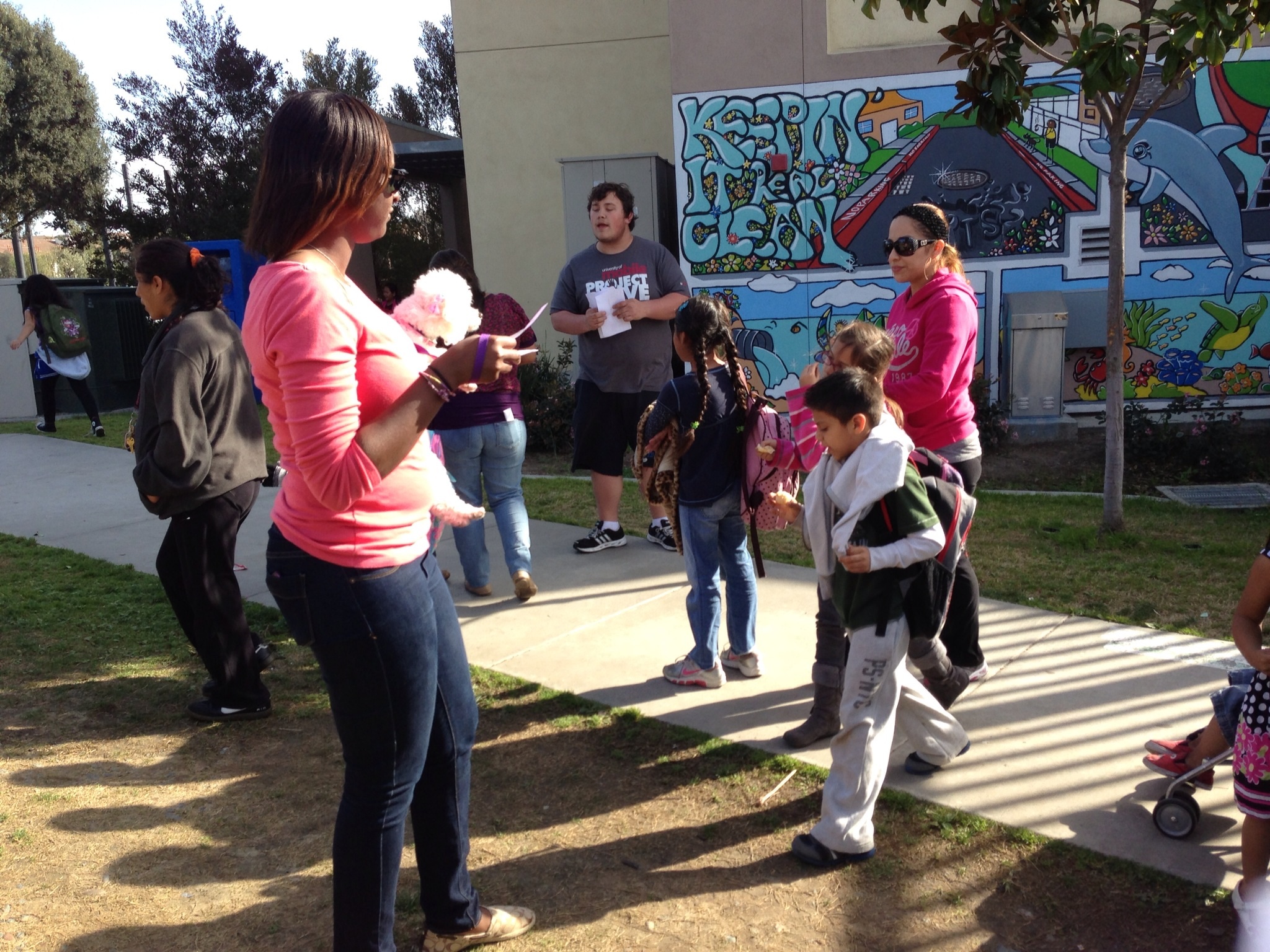 Handing out flyers in front of Fay Elementary school