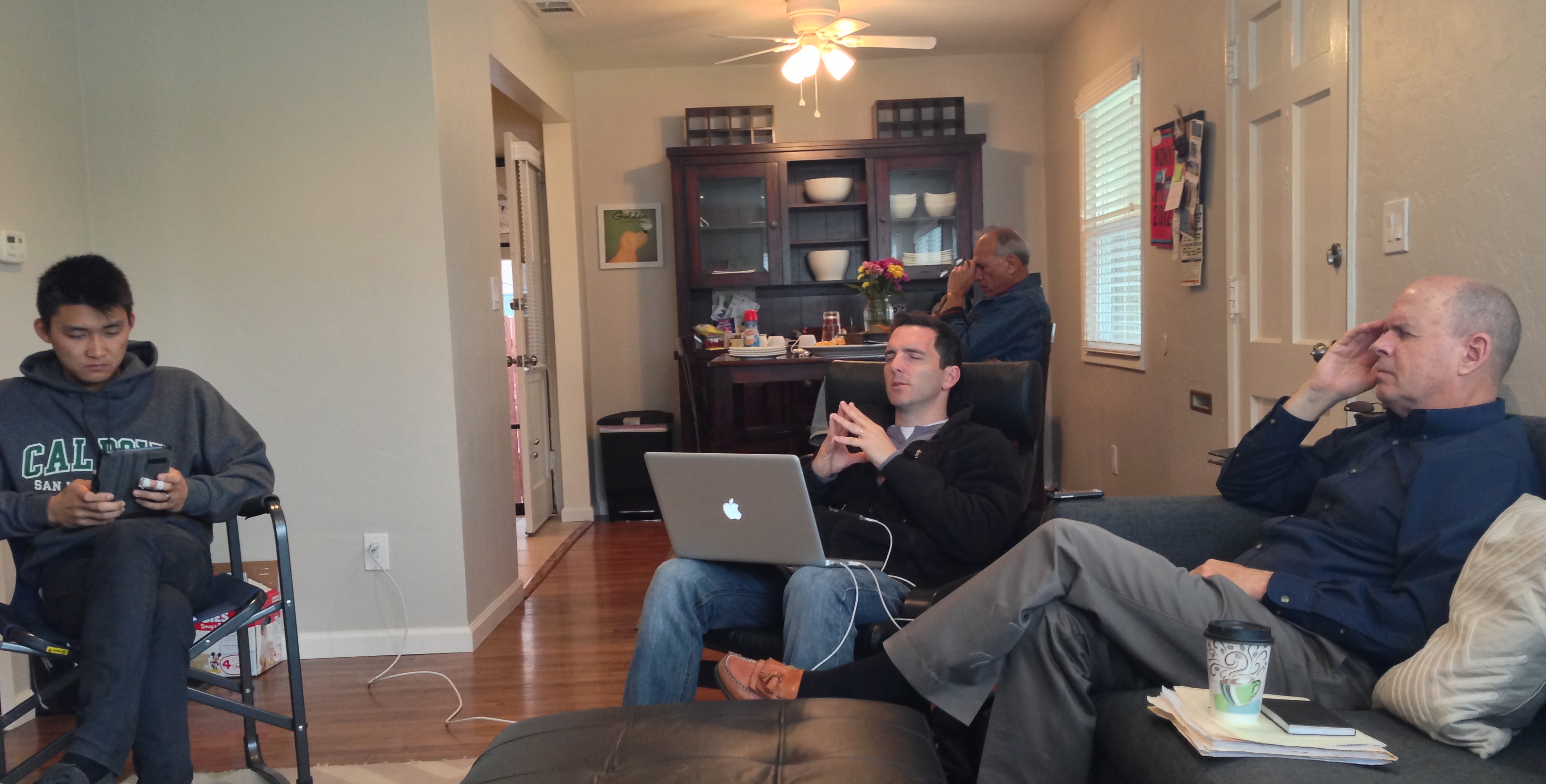 Prayer at one of our staff meetings - Thank the Lord for these friends!