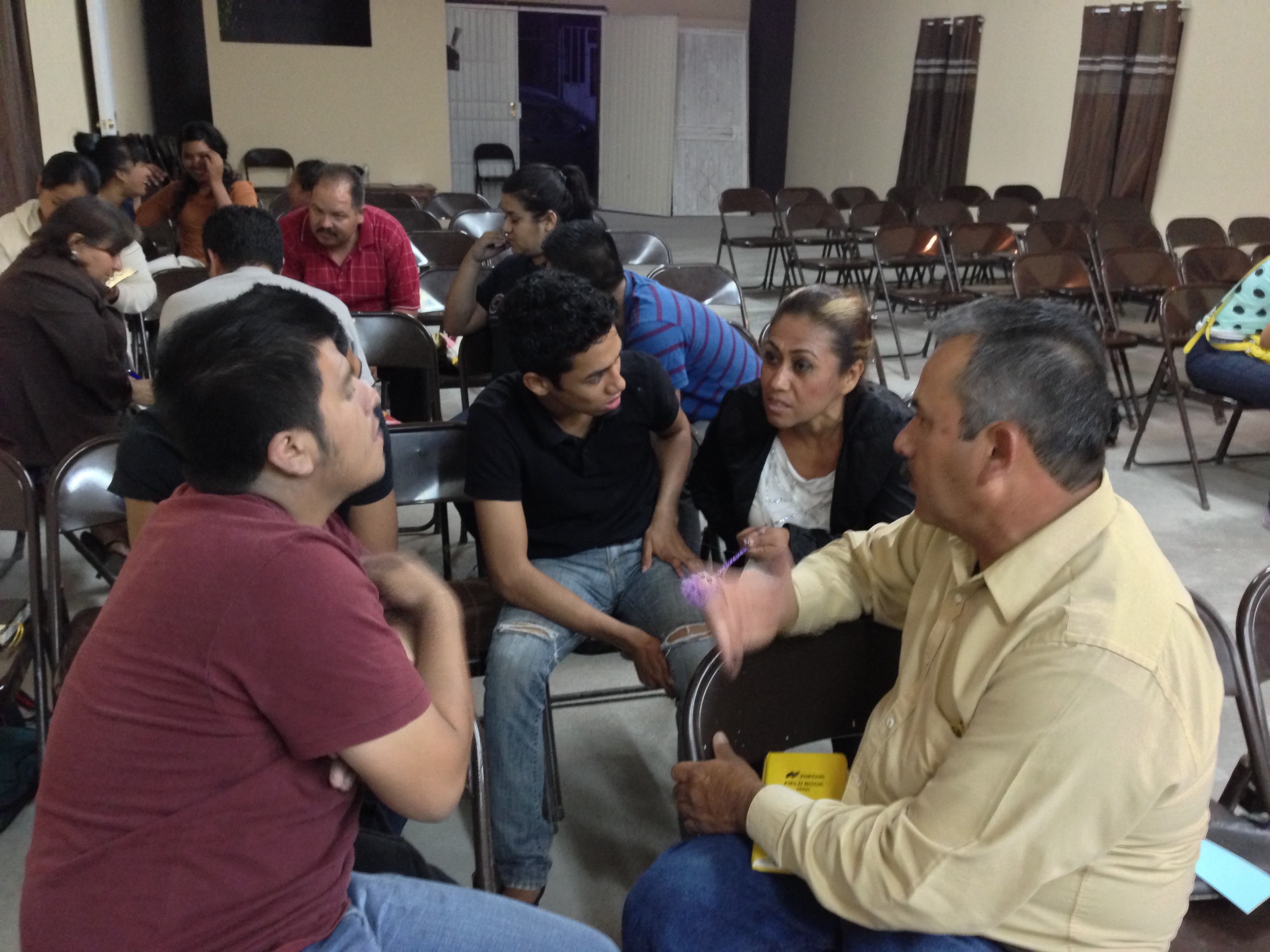 Pastor Mauro and his wife in a small group discussion