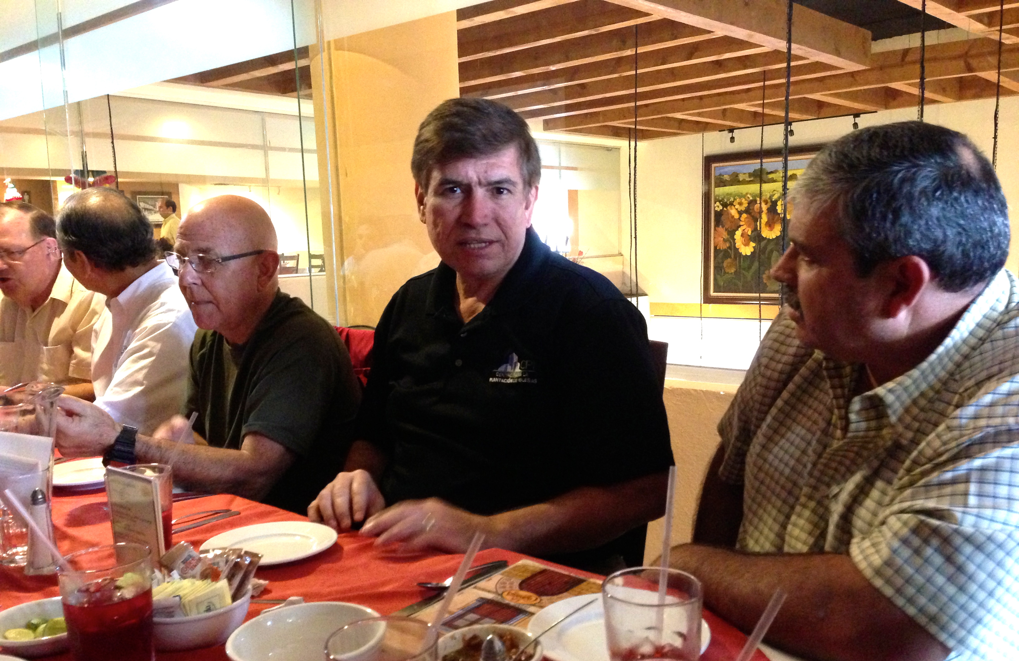 Andres Garza and Daniel Nuñez chatting over a wonderful Mexican meal
