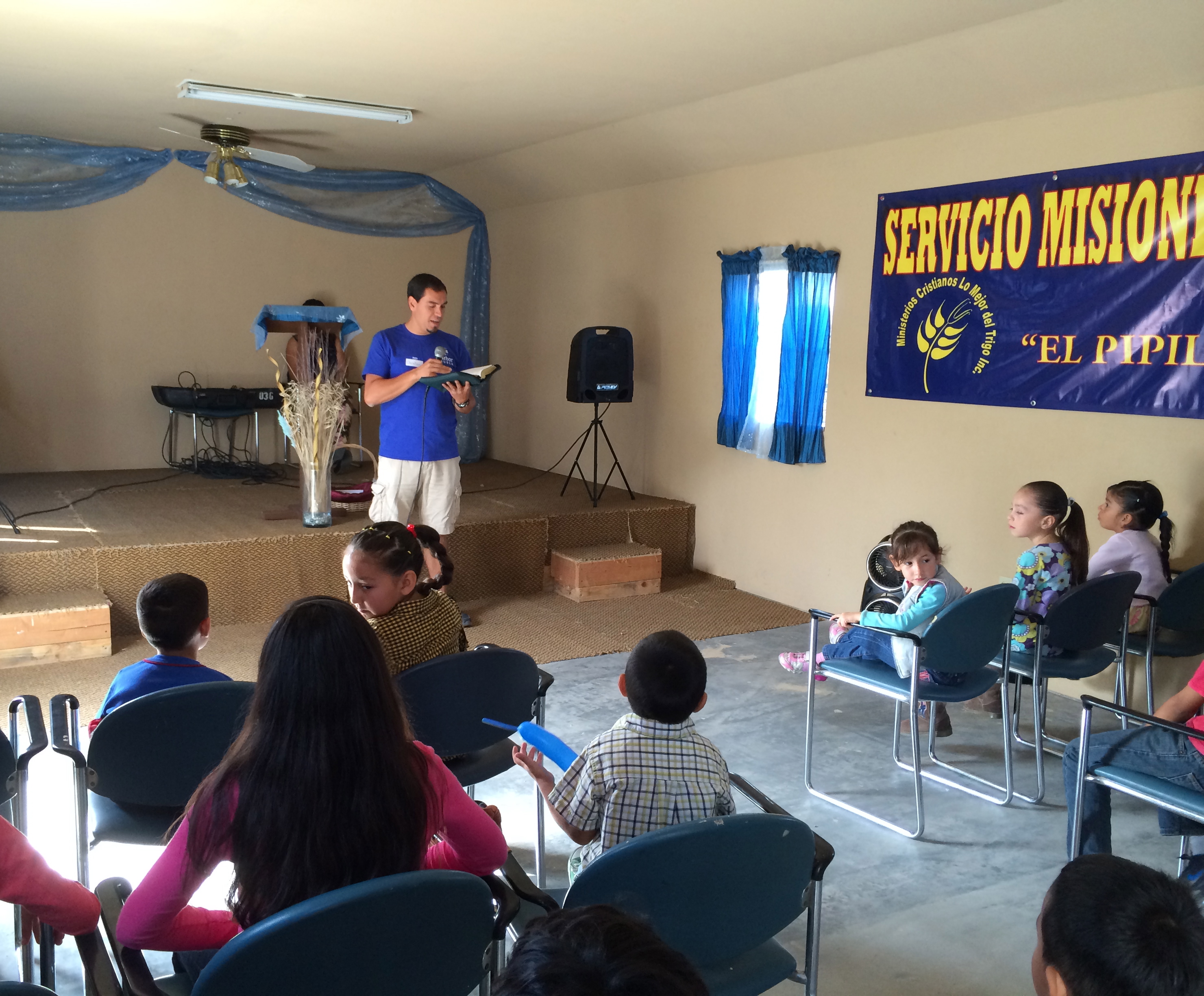 Christian Castro teaching a Bible Story for the children