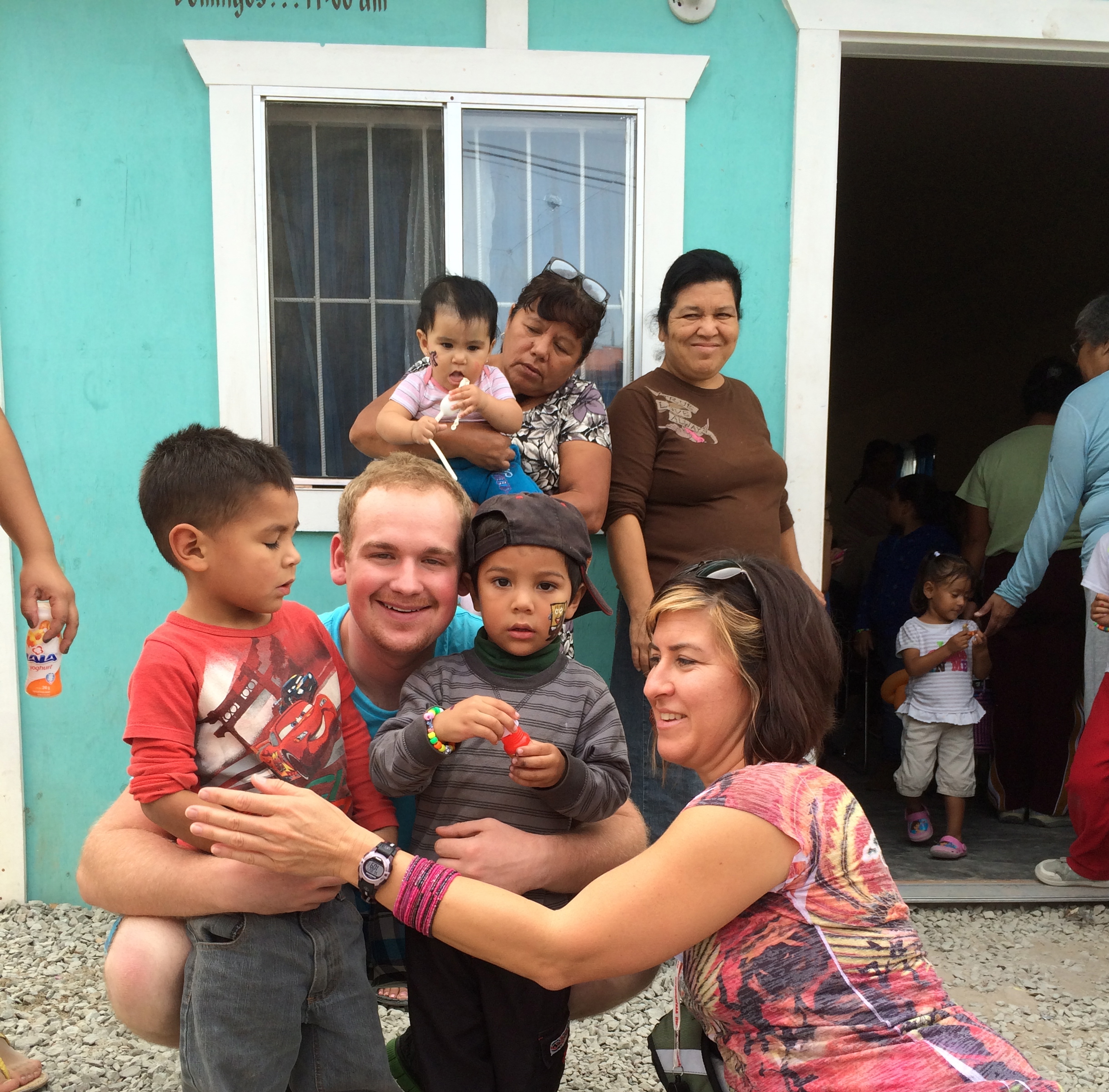 David Diaso Jr. and Jenn English with some of the children in Pípila