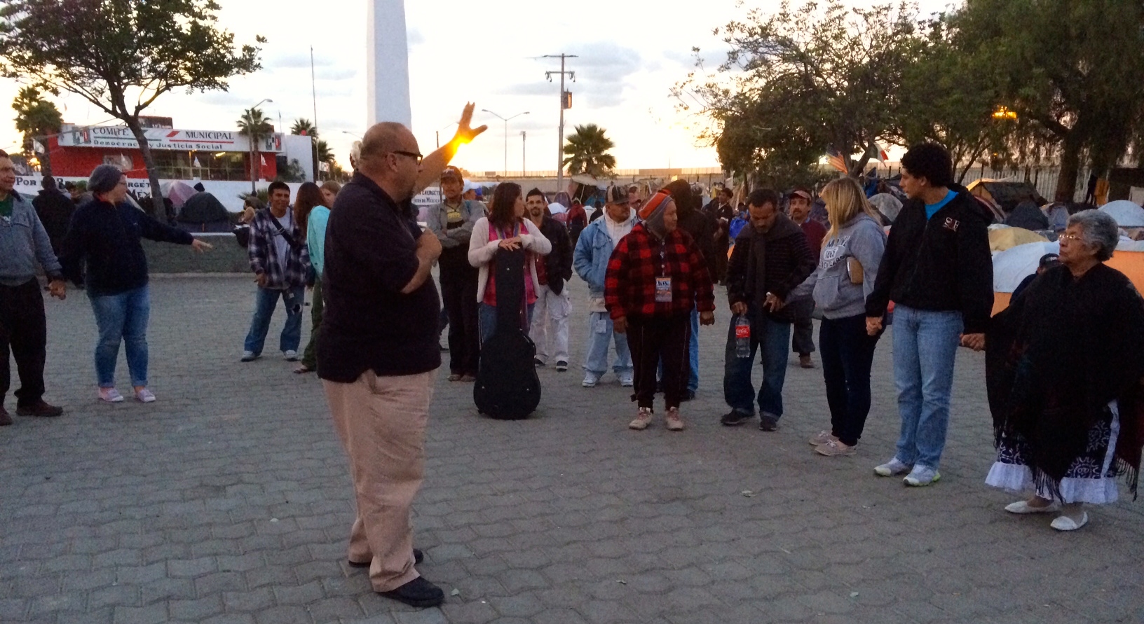pastor Leo leading us in prayer