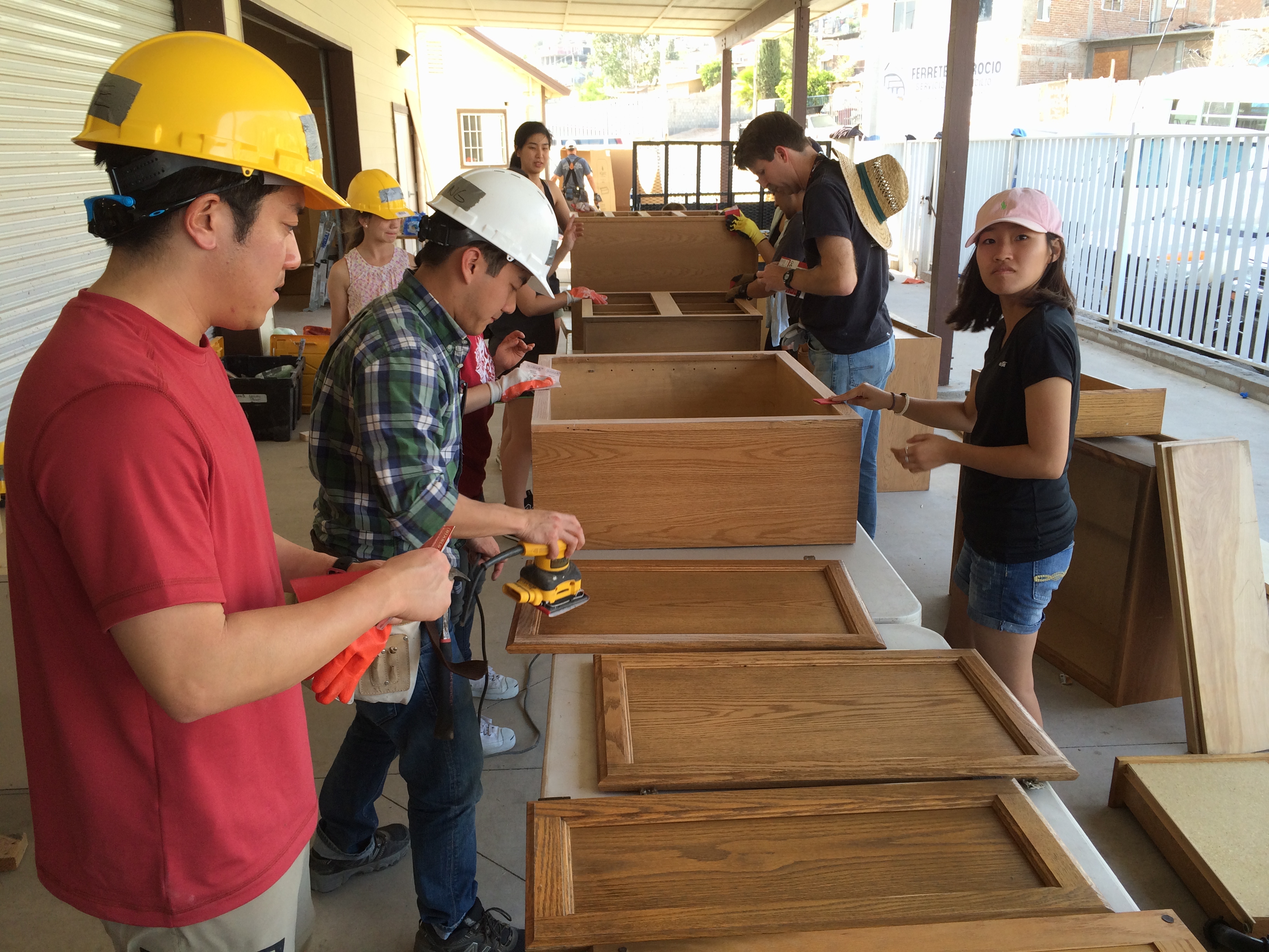 Redeemer working on the kitchen cabinets