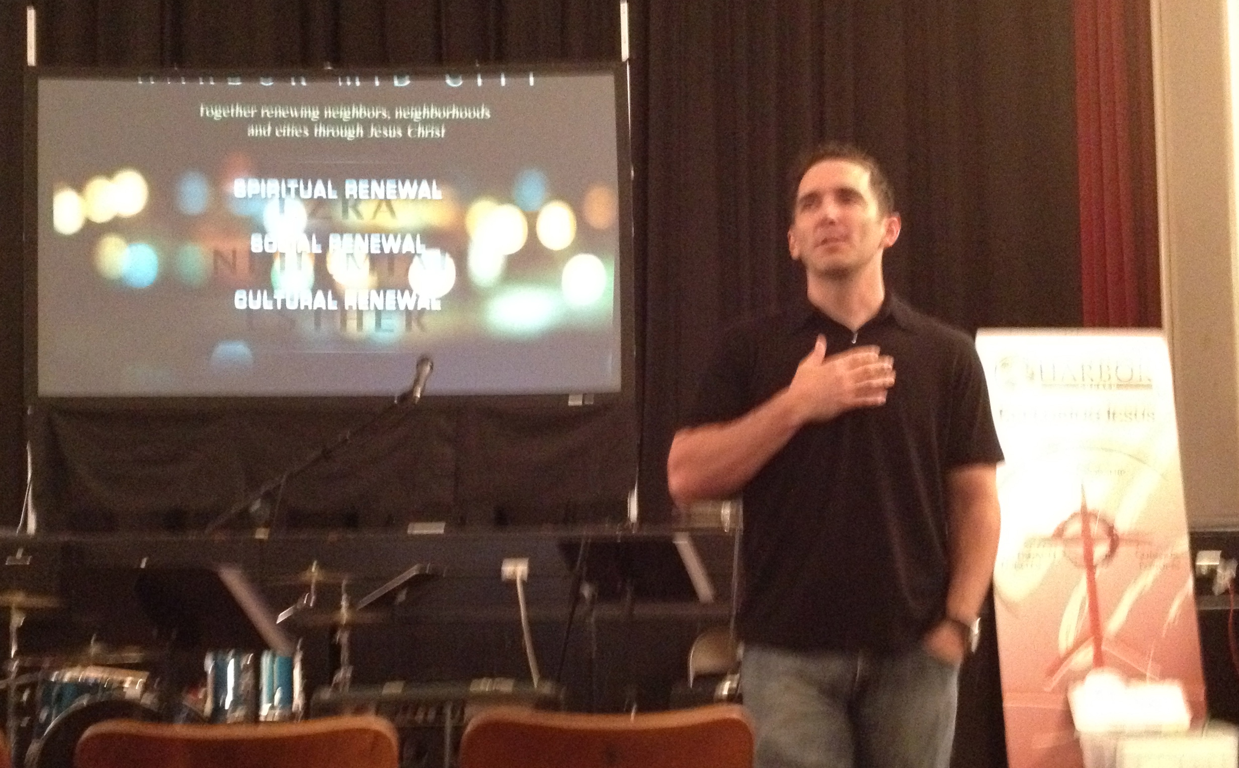 Pastor Stephen Phelan leading worship