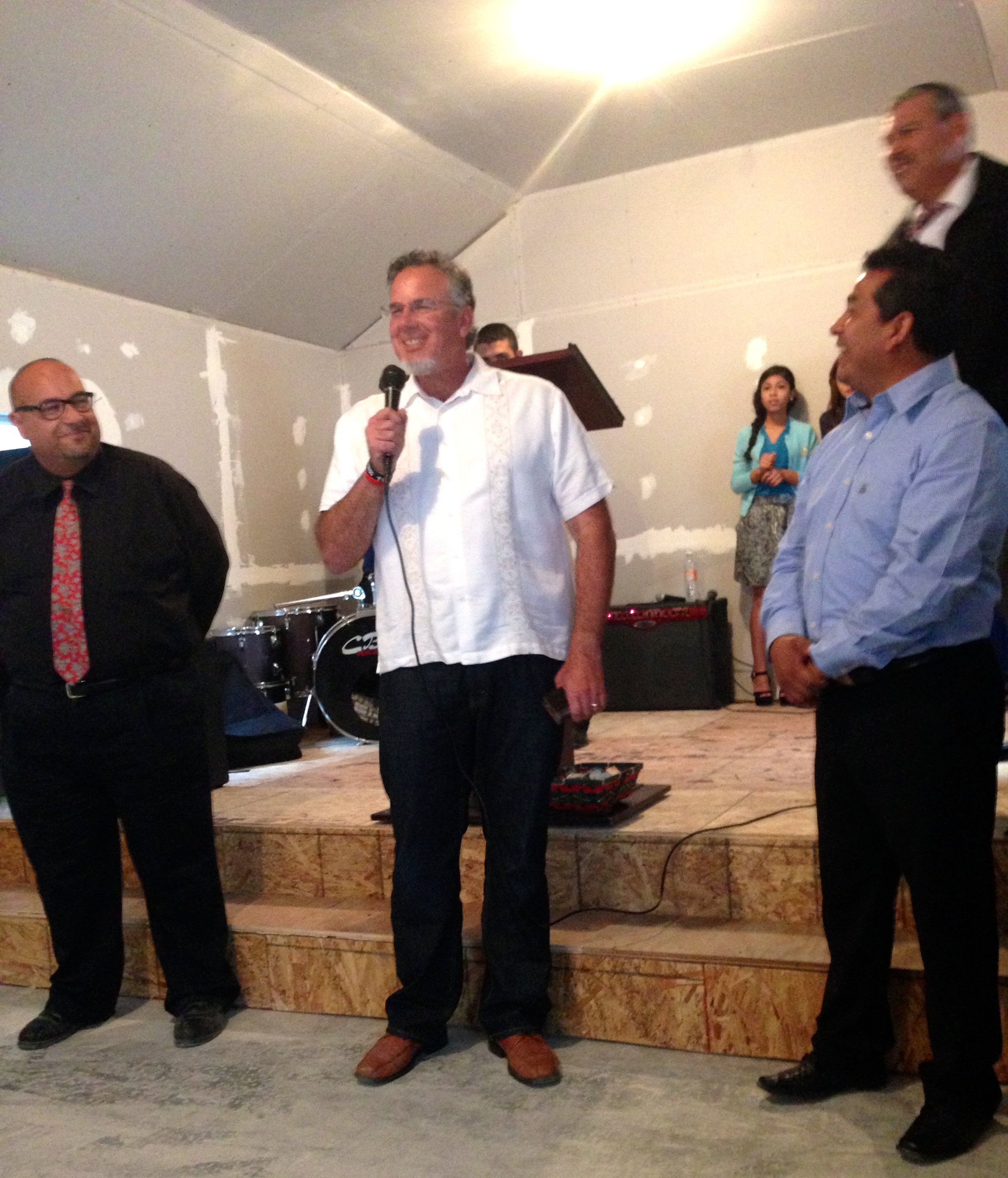Dave sharing some words of encouragement with Ivan and Rocio during the inaugural service