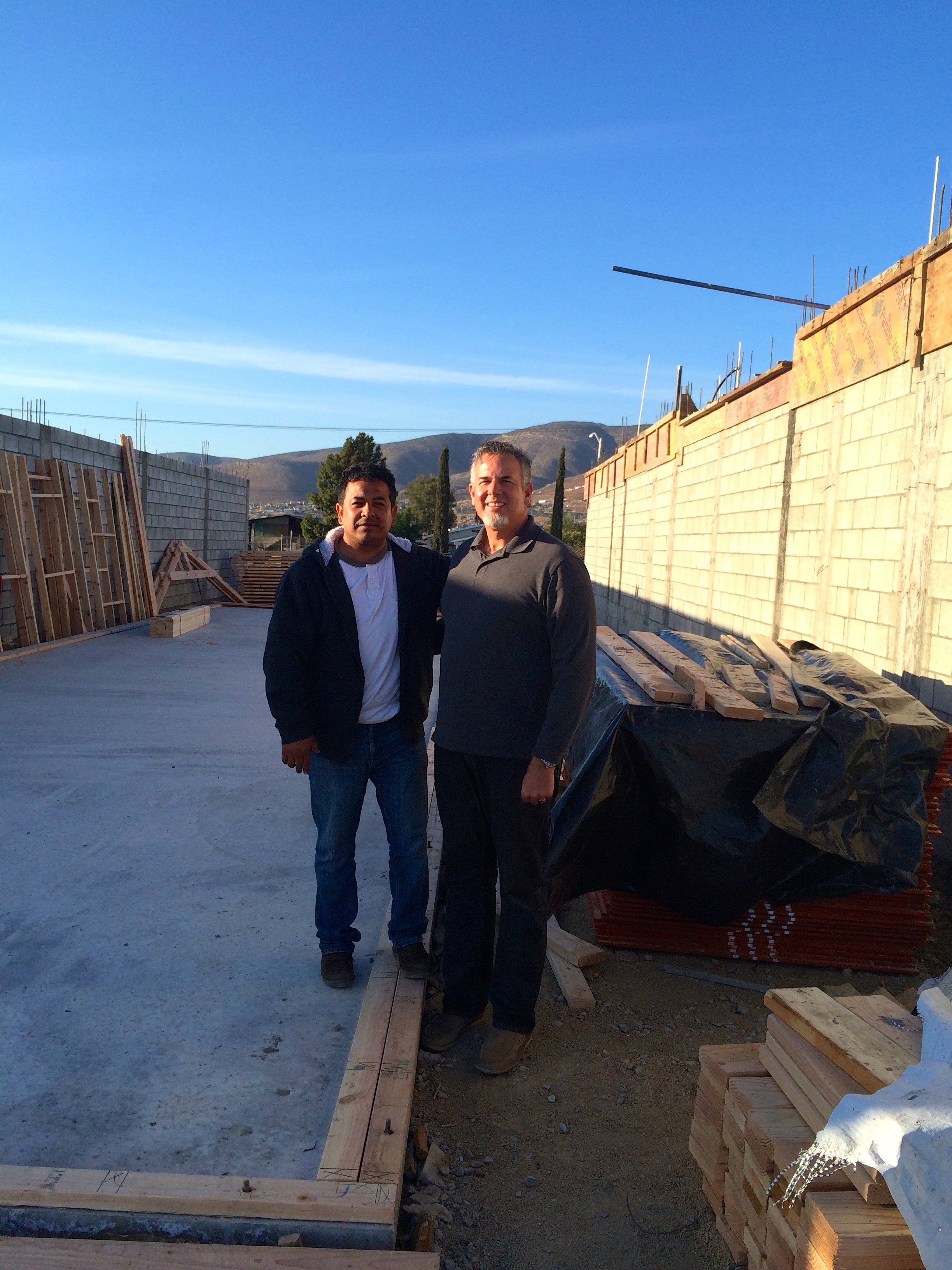 Ivan and Dave at the church site surrounded by all the building materials