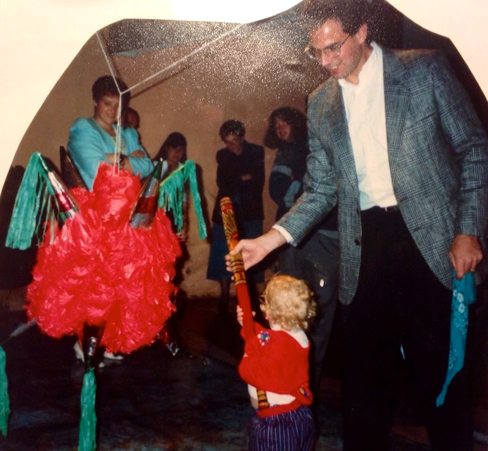 David having fun with the Piñata in Mexico