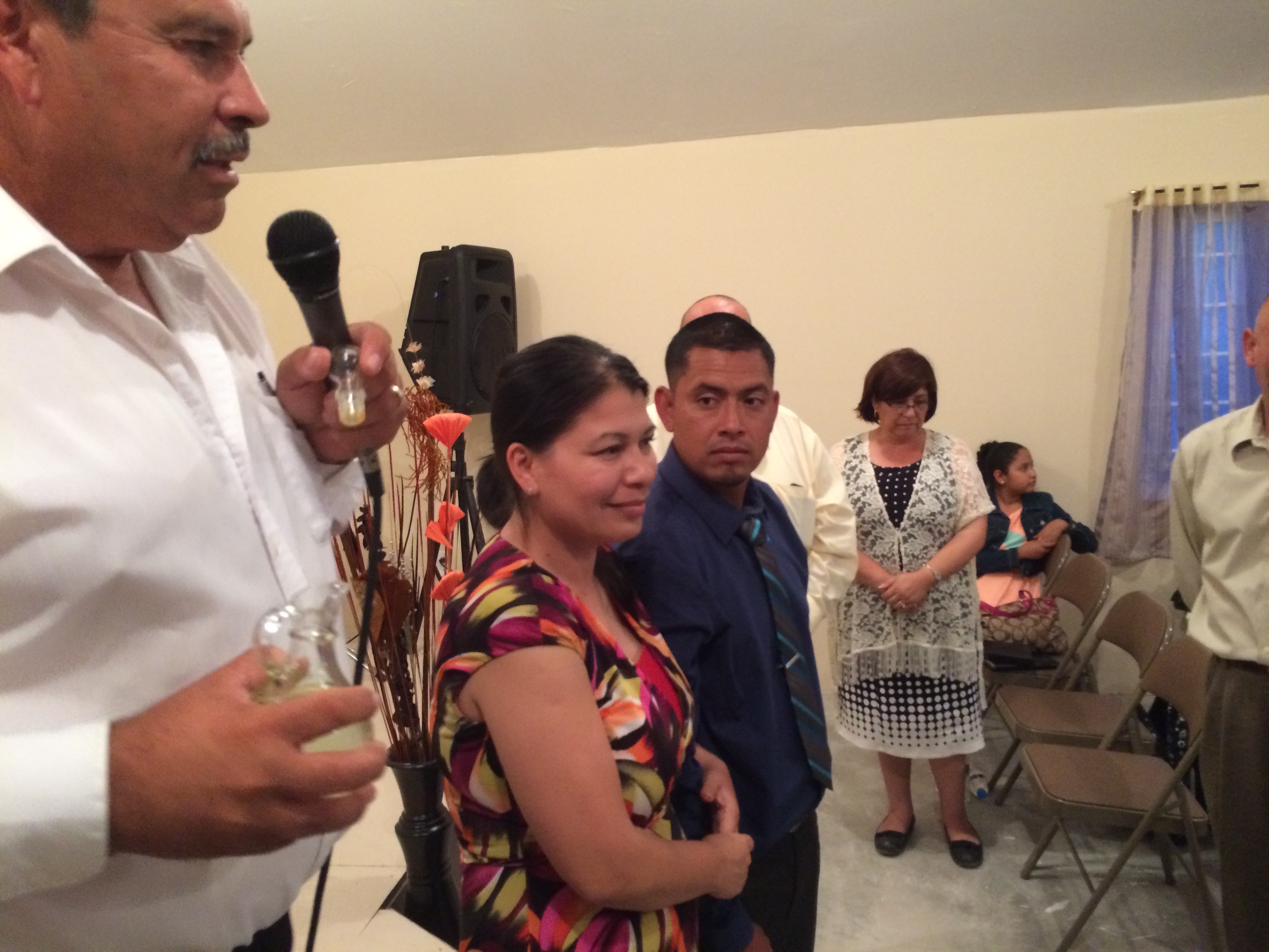 Pastor Daniel anointing Victor and Sol as they begin the ministry in Plan Libertador