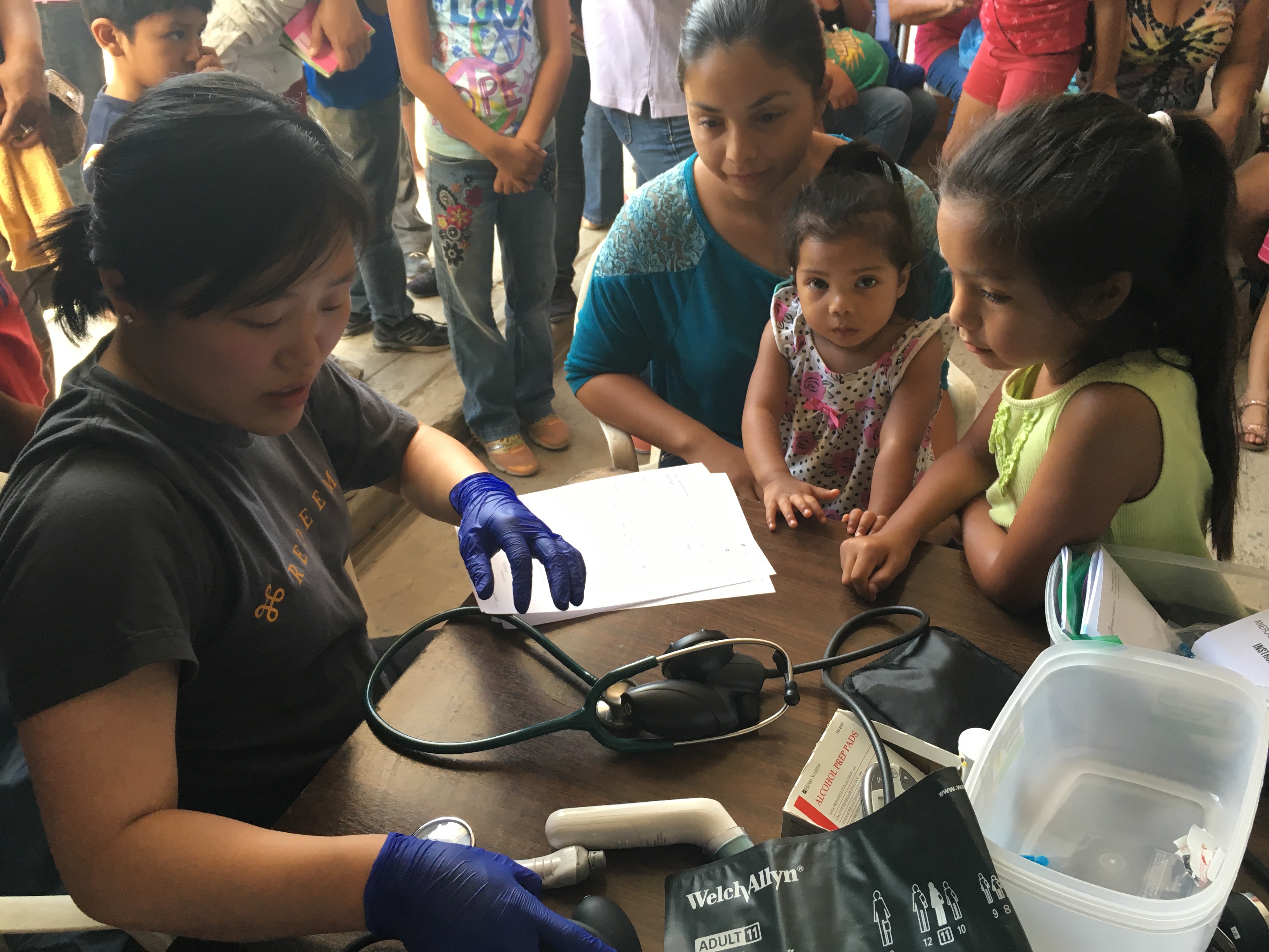 Oriesa taking the vitals and getting background info for the patients that were treated