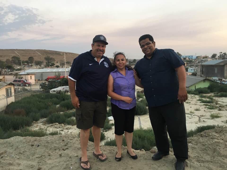 Pastor Daniel Nuñez with Arturo Vasquez and his wife on the property for MT's church plant #28!