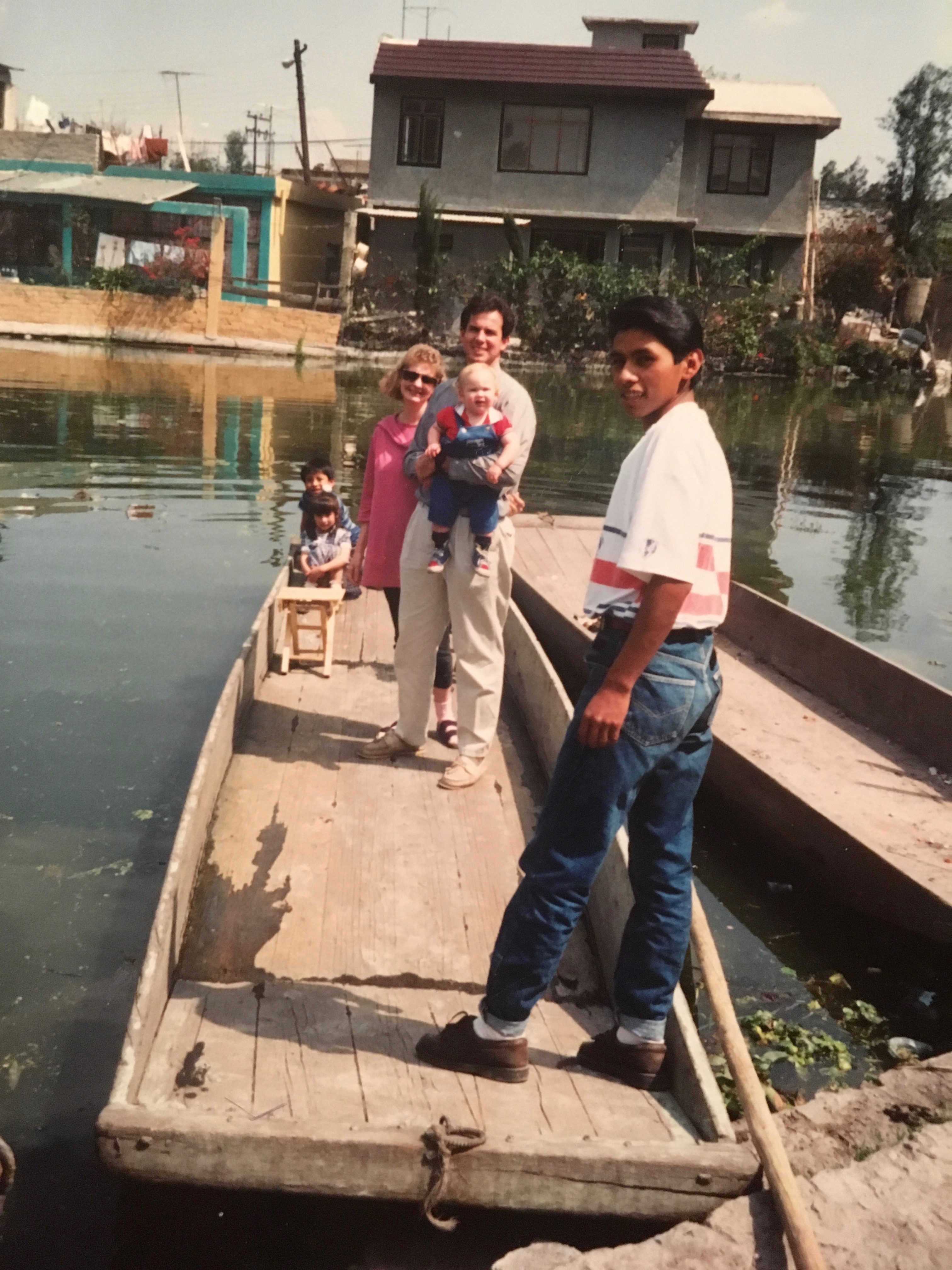 Enjoying a ride on a canoe with Armando Cisneros in Xochimilco