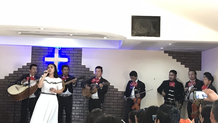 The Mariachis leading worship