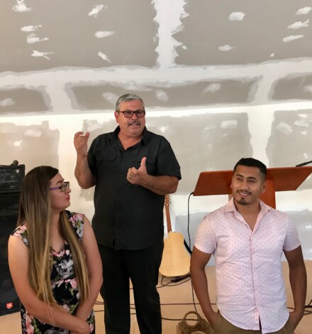 Pastor Daniel Nuñez leading us in a time of prayer and commissioning for Mere & Edna. It was a special time!