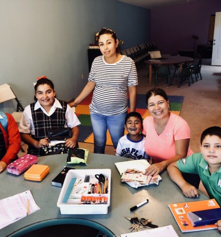Sol seated on the right with some of the children she is working with.