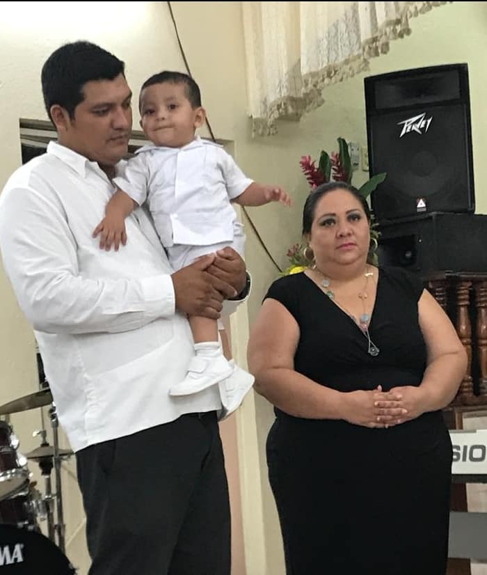 Pastor Luis with his wife, Gina and their son