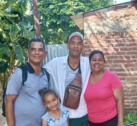 Pastor Justo on the left with Pastor Dunesky and his wife, Deneisy and their daughter