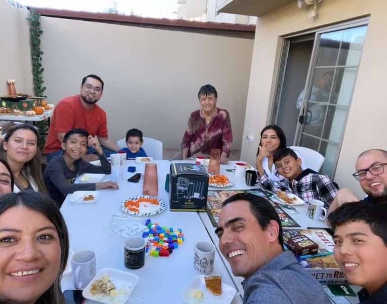 Armando and Lady, ministering to some families.