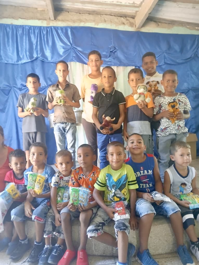 Children thankful to receive shoes from Hannah's Toys of Hope