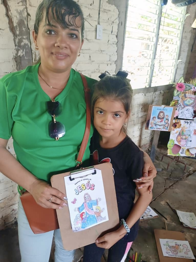 Yaima and one of the girls that Hannah's Toys of Hope serves