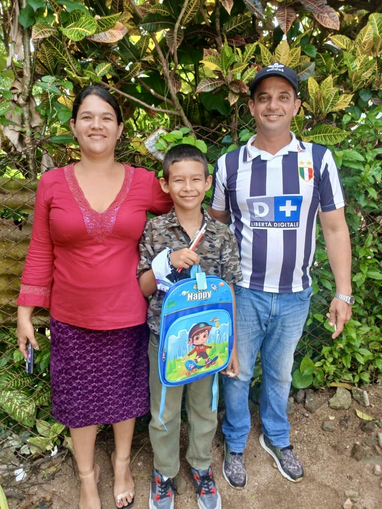 Grateful family receiving school supplies from Hannah's Toys of Hope ministry