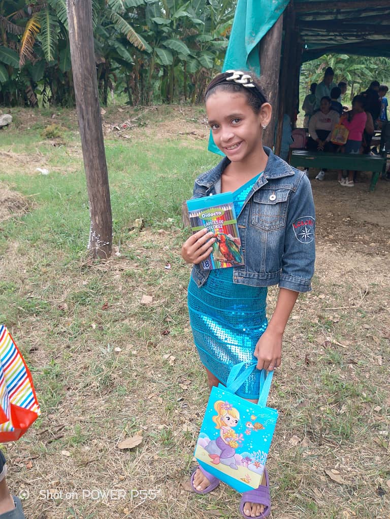 A liitle girl very happy with her new toy