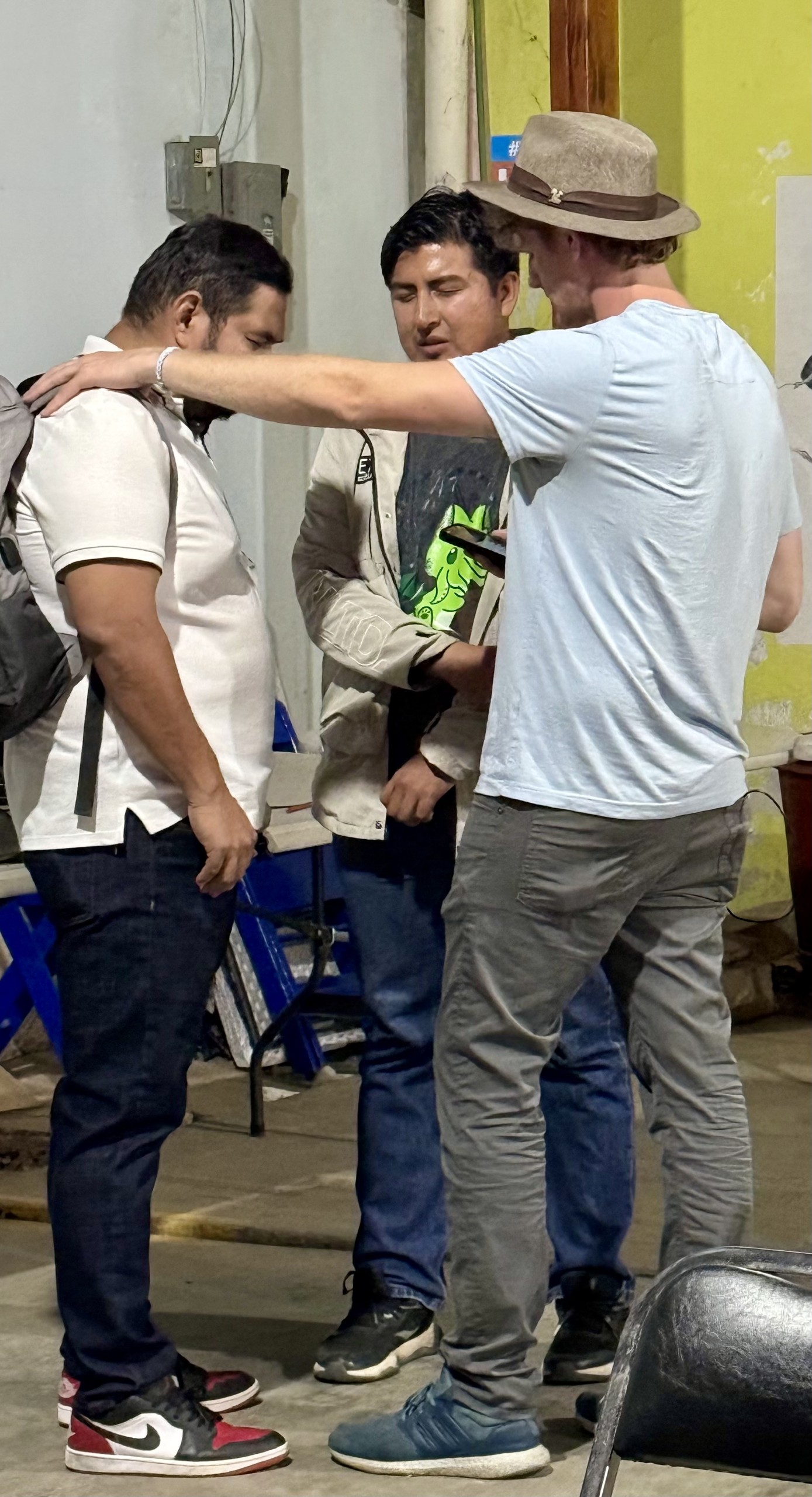 Jonathan Praying With Angel and Ricardo from Hospital de Fe.