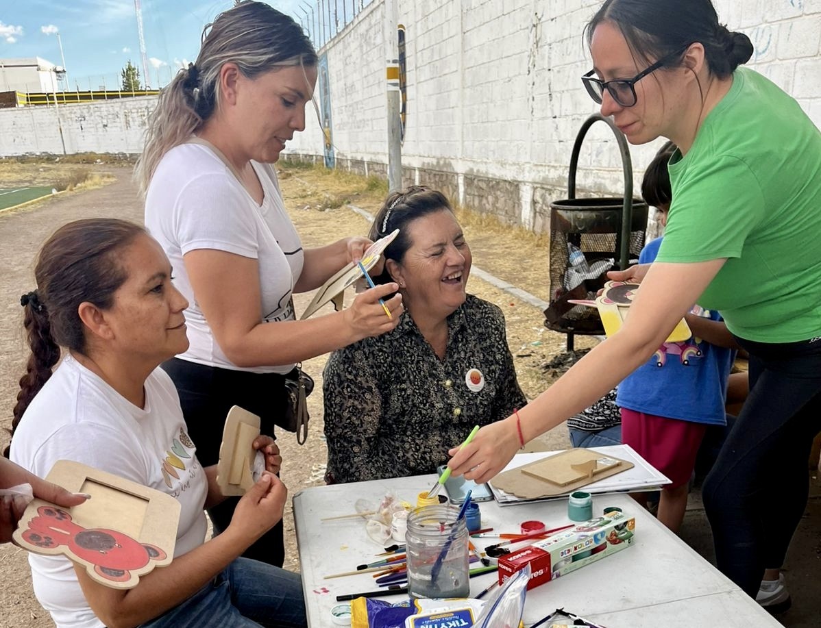 Margarita in the center with the ladies doing outreach in the park.