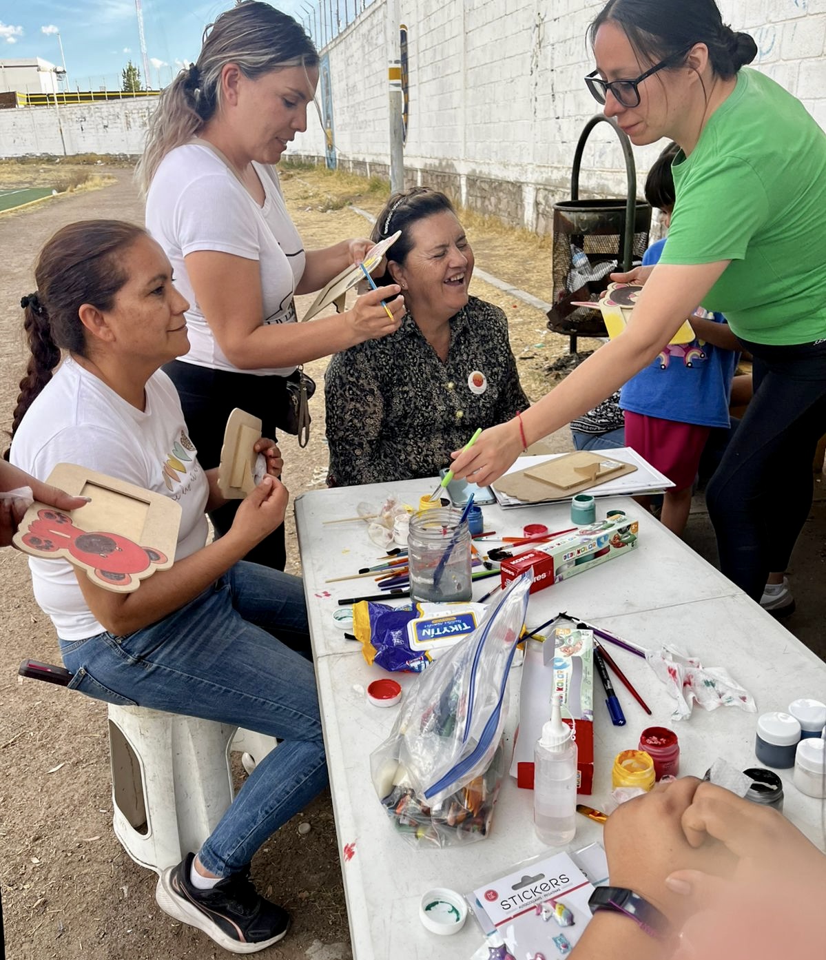 Ladies from the small groups in an outreach sharing and connecting through arts and crafts.