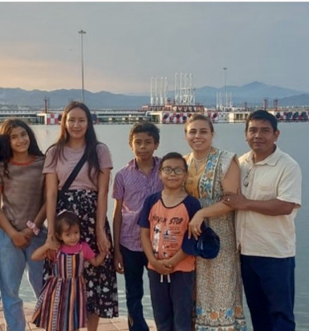 Pastor Jose Luis and his wife Mariel, with his two boys Josafat, and Asaf and a family from their new church.