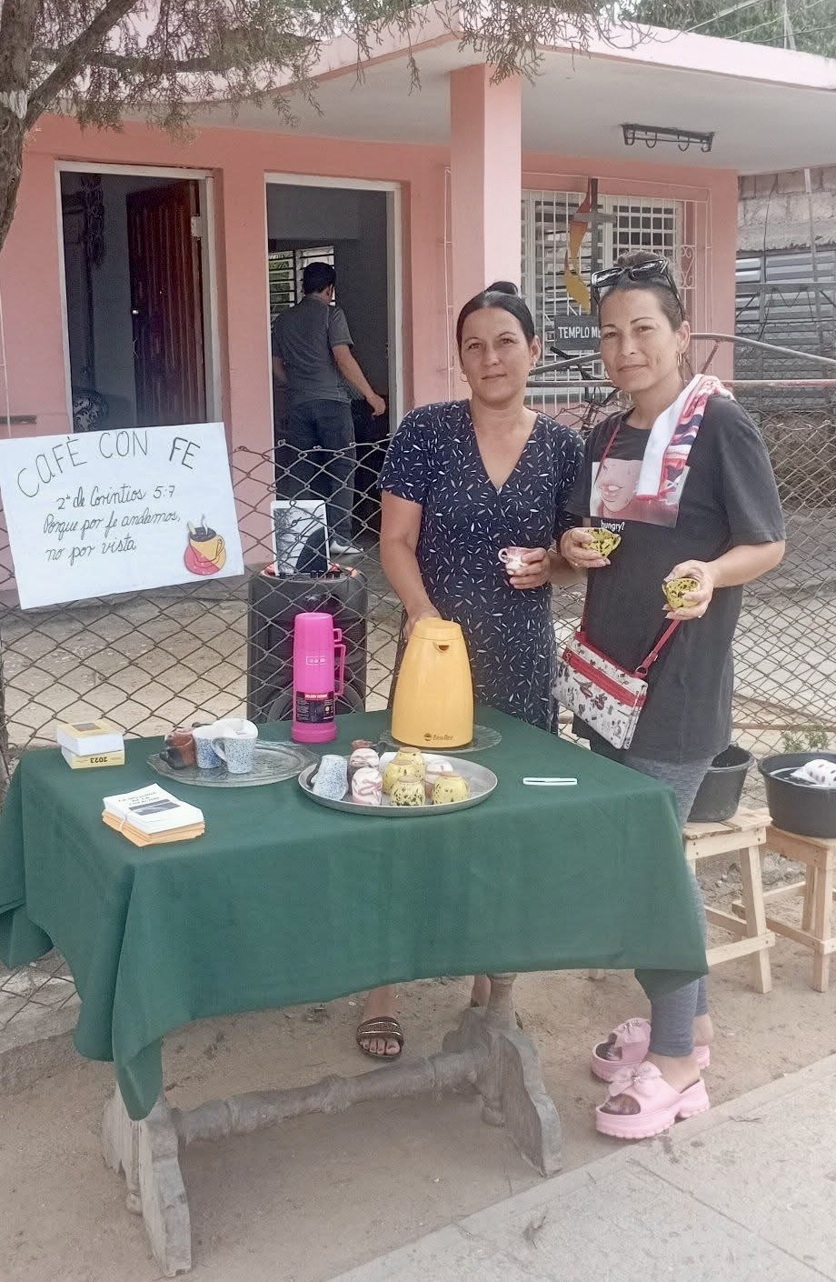 Dayana and a friend serving their community one cup—and one conversation—at a time.