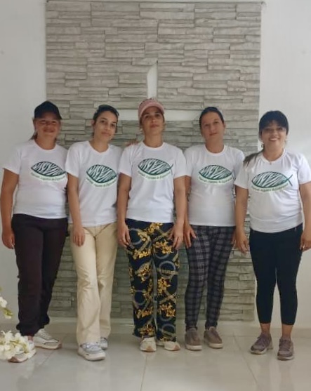 Part of the ministry team that works with Yaima for Hannah's Toys of Hope wearing their t-shirts