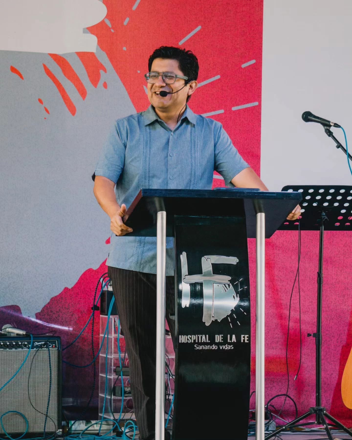 Pastor Eliel leading worship at Hospital de Fe as the congregation continues to grow.