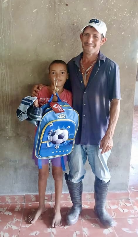 Carlos Antonio and his step-dad Anioski
