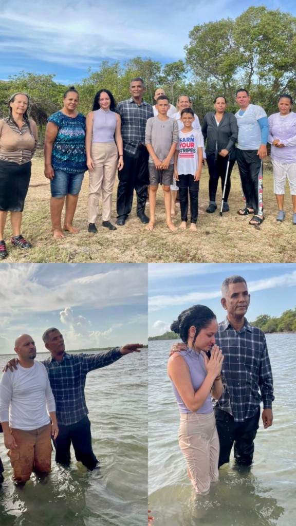 Pastor Justo baptizing new believers in his congregation.
