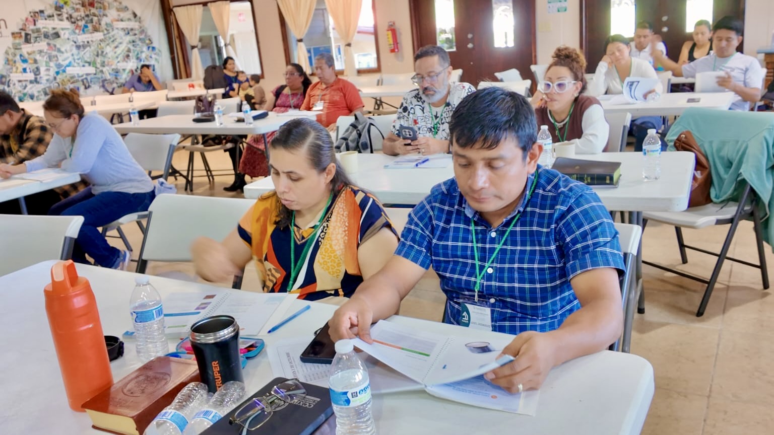 Couples in a session learning more and growing together.